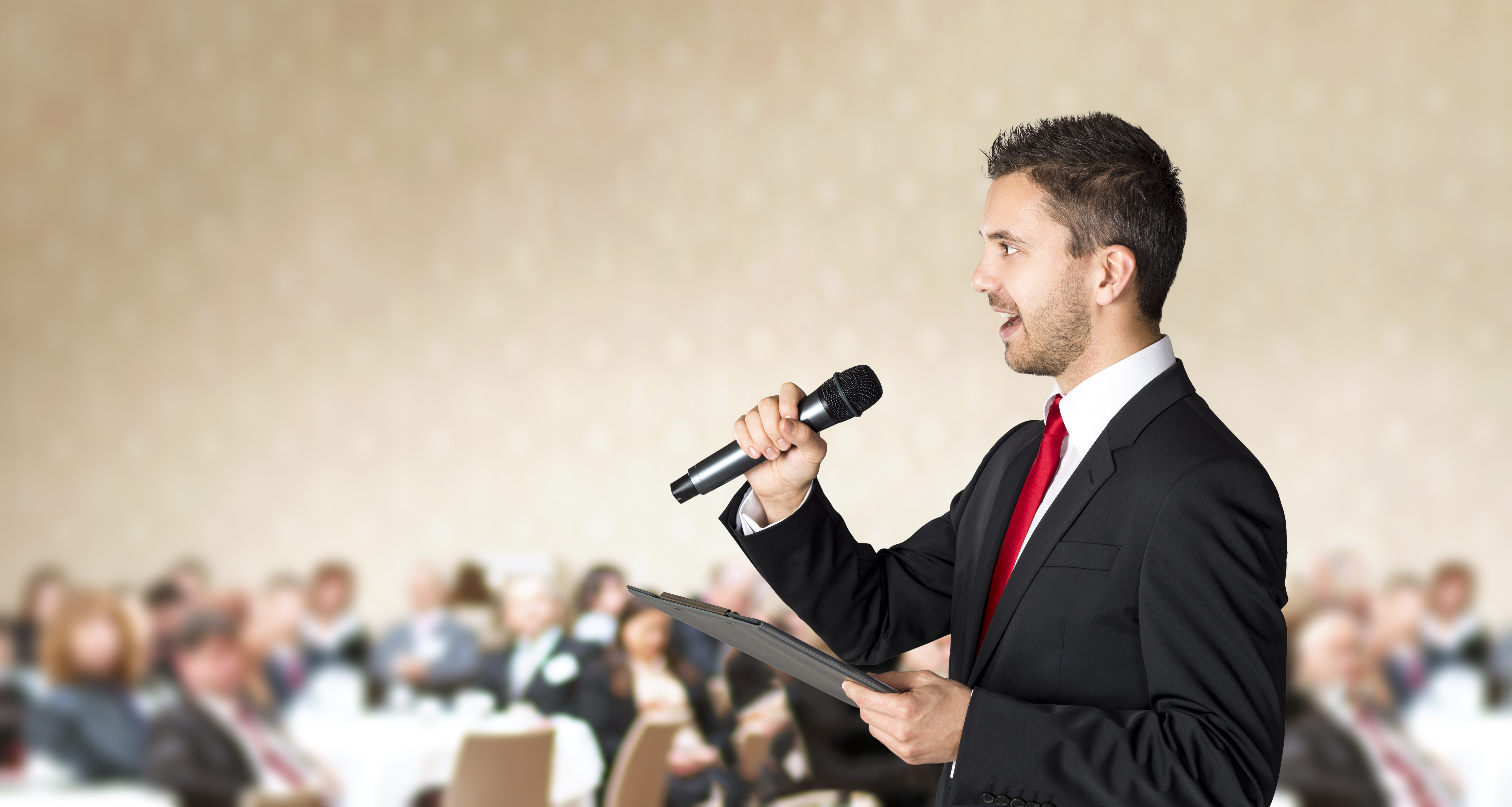 graphicstock-man-is-speaking-on-indoor-business-conference-for-manager